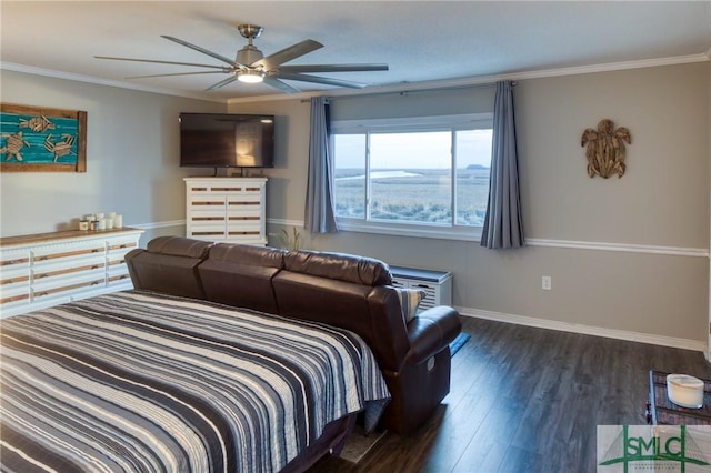 bedroom with crown molding, dark hardwood / wood-style floors, and ceiling fan