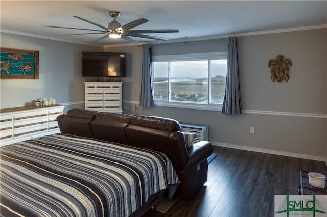 bedroom featuring ceiling fan, ornamental molding, and dark hardwood / wood-style flooring