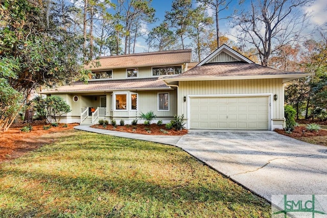 view of front facade featuring a garage and a front lawn