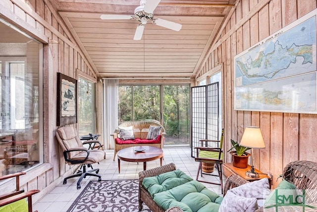 sunroom featuring lofted ceiling, wood ceiling, and ceiling fan