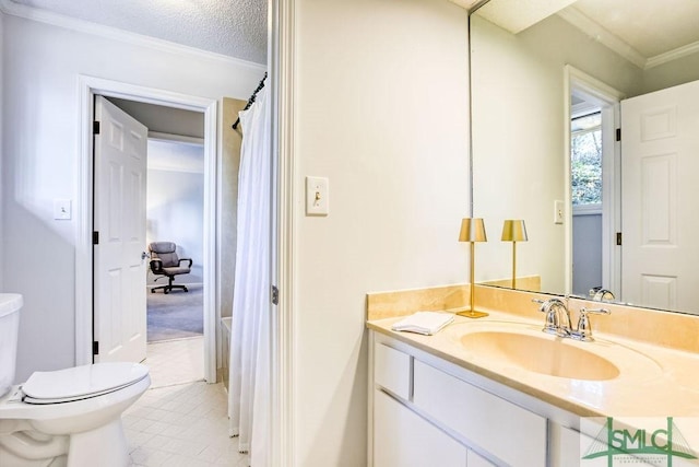 bathroom featuring tile patterned floors, toilet, crown molding, a textured ceiling, and vanity