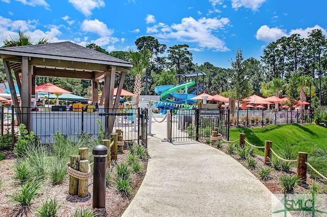 surrounding community with a gazebo and a playground