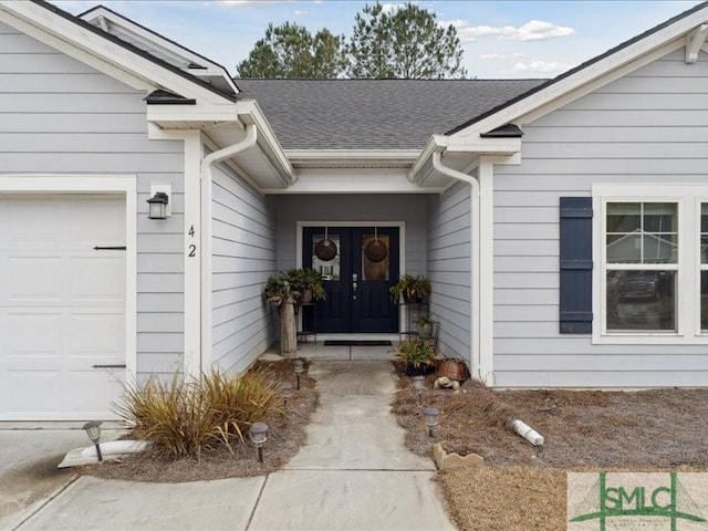 entrance to property featuring a garage