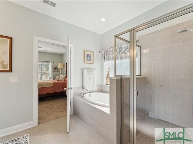 bathroom with plus walk in shower and tile patterned floors