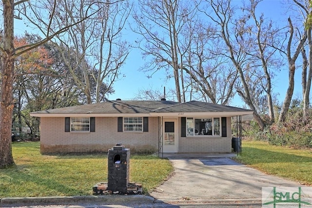 ranch-style house with a front yard