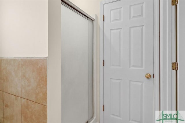 bathroom with an enclosed shower