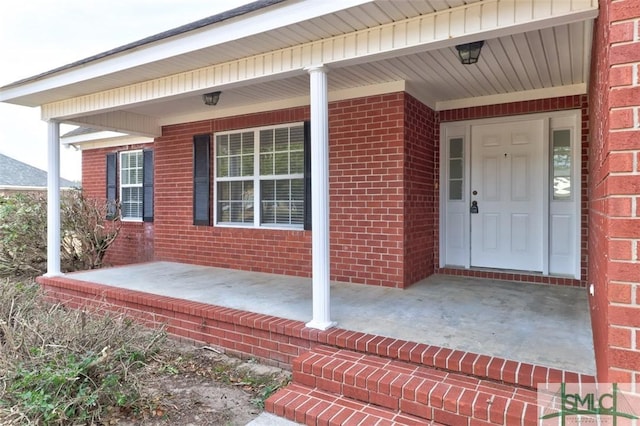 entrance to property with covered porch