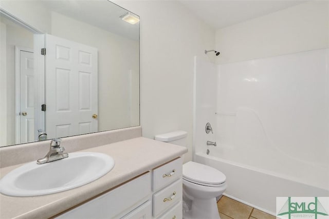 full bathroom with tile patterned flooring, vanity, shower / bath combination, and toilet