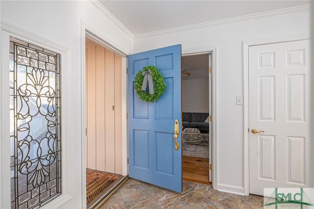 entryway with crown molding