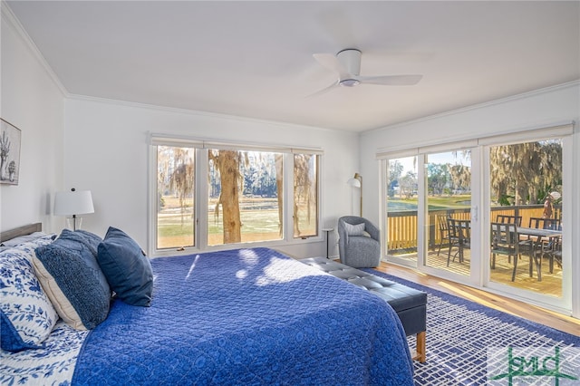 bedroom with crown molding, hardwood / wood-style floors, access to exterior, and ceiling fan