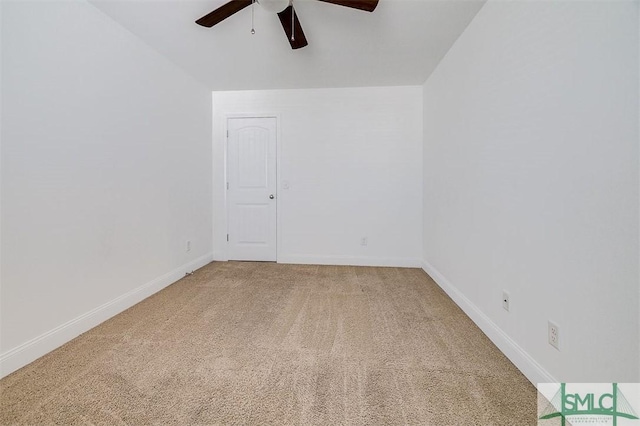 unfurnished room featuring carpet floors, ceiling fan, and baseboards