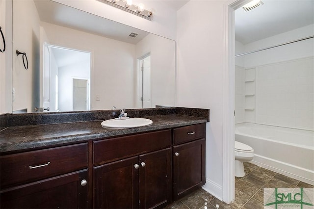 full bath with toilet, tub / shower combination, vanity, and visible vents