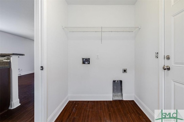 clothes washing area featuring laundry area, baseboards, dark wood-type flooring, and electric dryer hookup