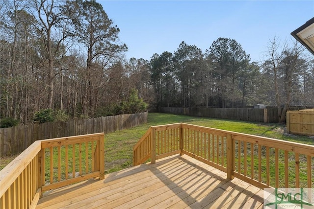 deck featuring a lawn