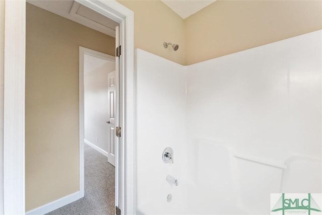 bathroom with shower / bath combination