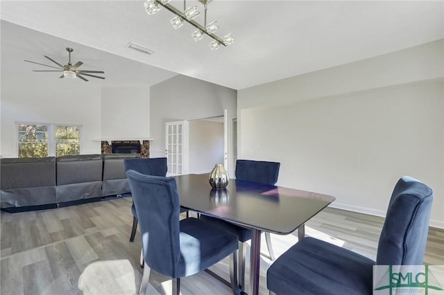 dining room featuring light hardwood / wood-style flooring and ceiling fan