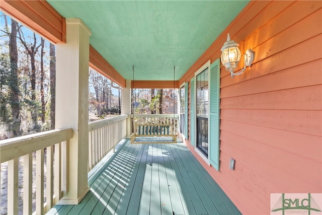 deck featuring covered porch