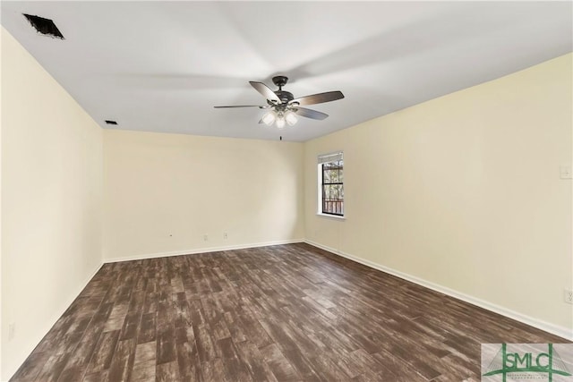 unfurnished room with wood finished floors, baseboards, and ceiling fan