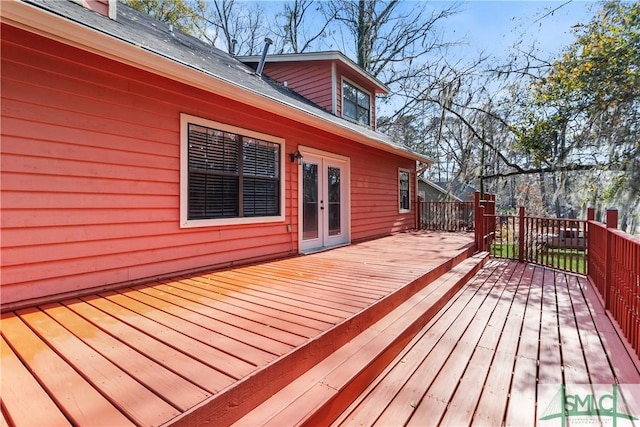 wooden deck featuring french doors