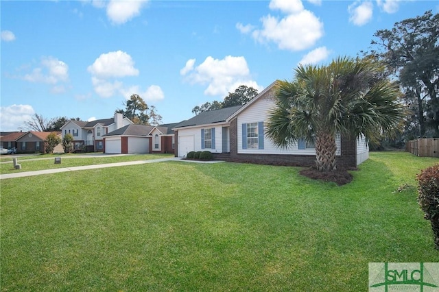 ranch-style house with a garage and a front yard