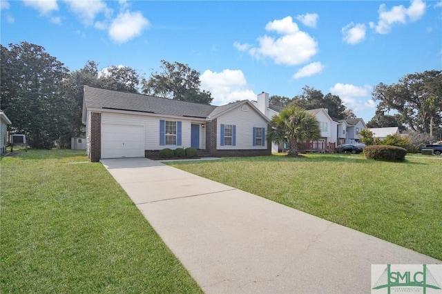 ranch-style house featuring a garage and a front lawn