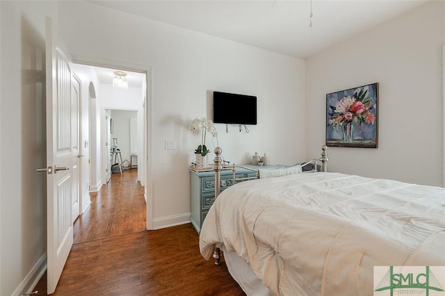 bedroom featuring dark hardwood / wood-style flooring