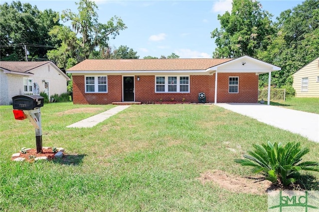 ranch-style home with a carport and a front lawn