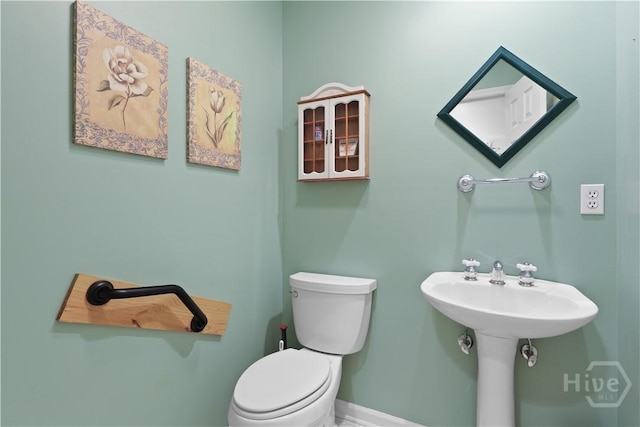 1280 Little Mccall Rd, Guyton, GA 31312 - half bath with toilet and baseboards