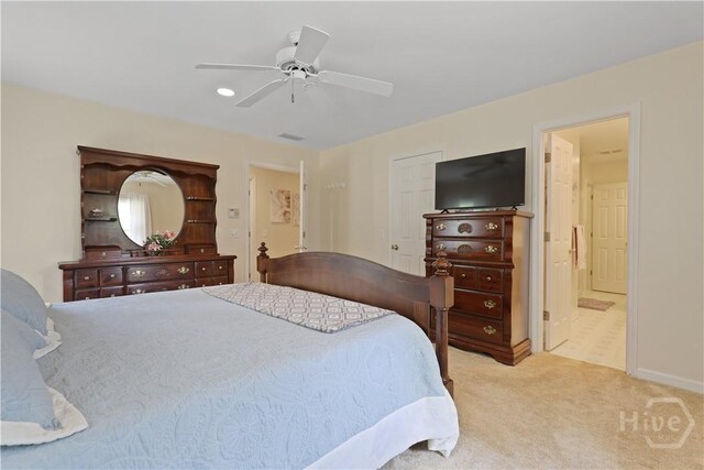 1280 Little Mccall Rd, Guyton, GA 31312 - carpeted bedroom featuring connected bathroom and ceiling fan