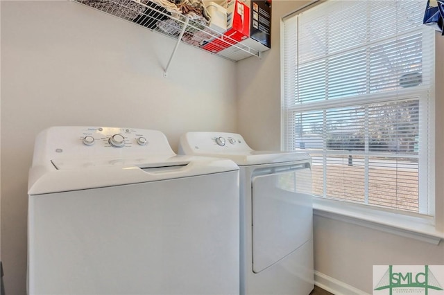 washroom with separate washer and dryer