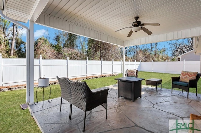 view of patio featuring an outdoor living space and ceiling fan