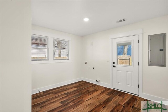 1108 E 39th St, Savannah, GA 31404 - spare room featuring electric panel, dark wood-type flooring, baseboards, and recessed lighting