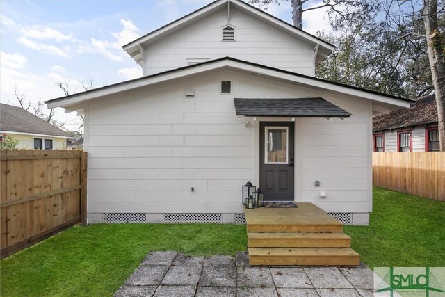 1108 E 39th St, Savannah, GA 31404 - back of house with crawl space and a shingled roof