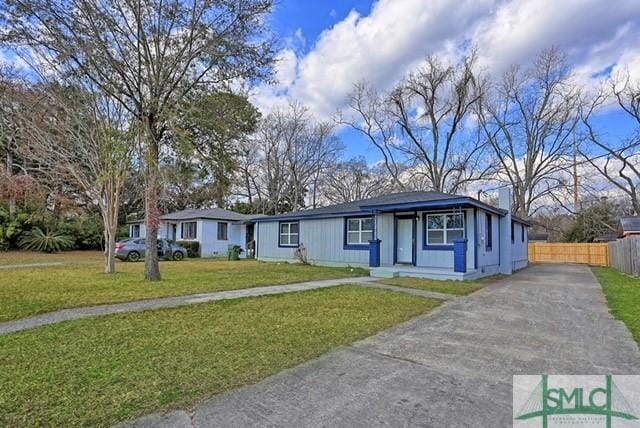 view of front of house with a front lawn