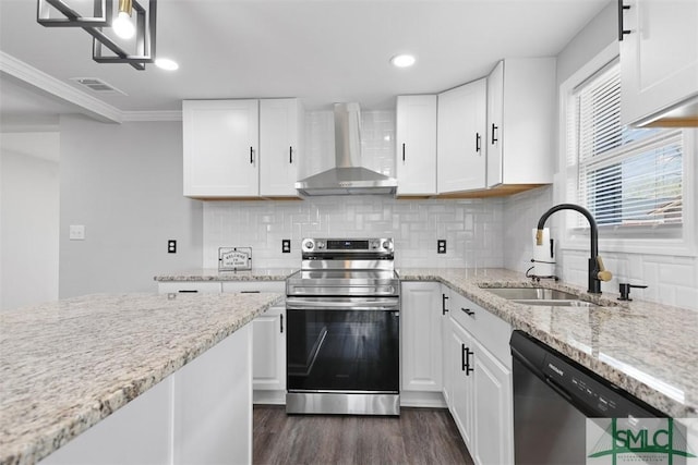 kitchen featuring white cabinetry, sink, wall chimney exhaust hood, and appliances with stainless steel finishes