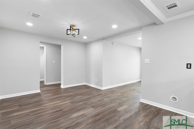 spare room with dark wood-type flooring