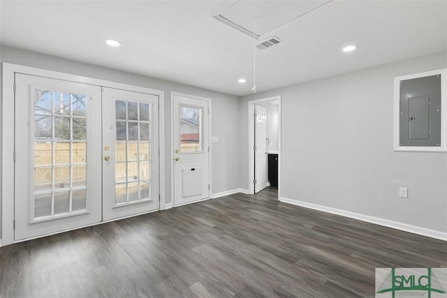 interior space with french doors, dark hardwood / wood-style floors, and electric panel