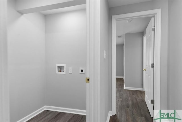 clothes washing area featuring dark wood-type flooring, washer hookup, and hookup for an electric dryer