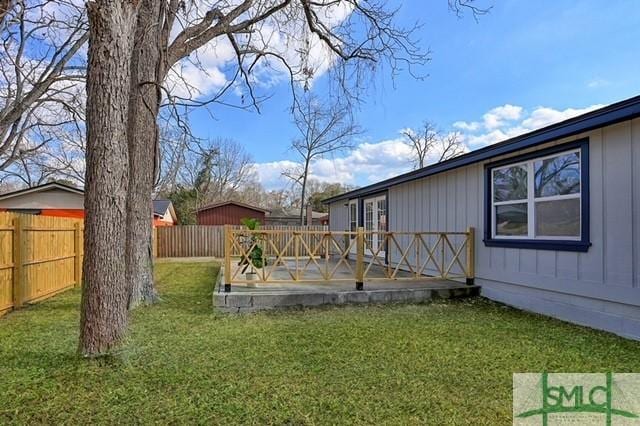 view of yard with a deck