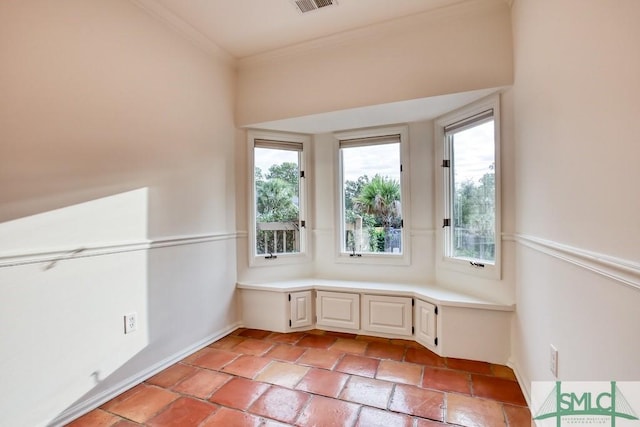 interior space featuring ornamental molding