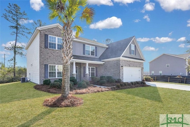 view of front of house with a garage, central AC unit, and a front yard