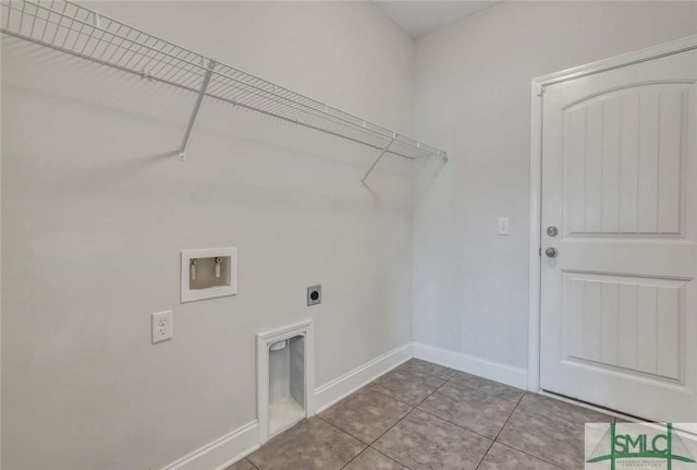 laundry room with hookup for a washing machine, tile patterned floors, and hookup for an electric dryer