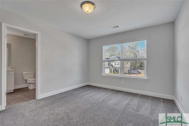 view of carpeted spare room