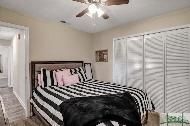 bedroom with a closet and ceiling fan