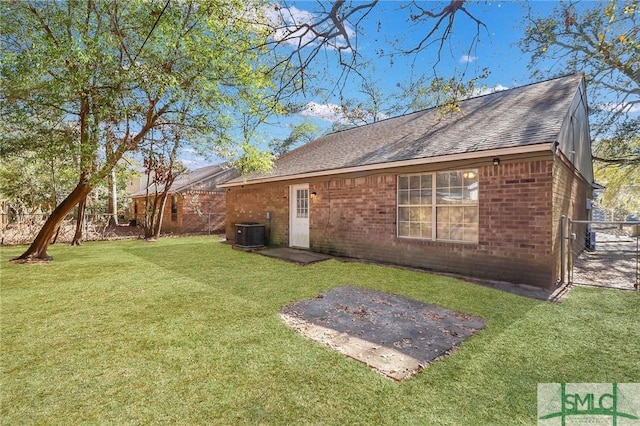 back of house with a patio, cooling unit, and a lawn