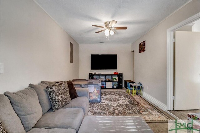 living room featuring ceiling fan