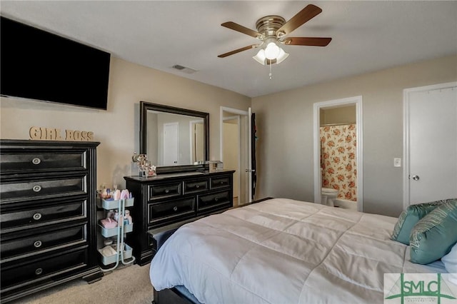 carpeted bedroom featuring connected bathroom and ceiling fan