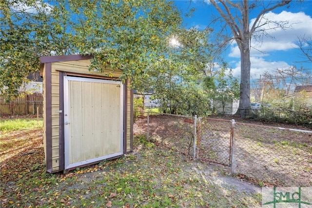 view of shed featuring fence private yard