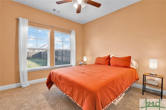 carpeted bedroom featuring ceiling fan