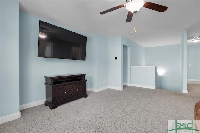 carpeted living room featuring ceiling fan